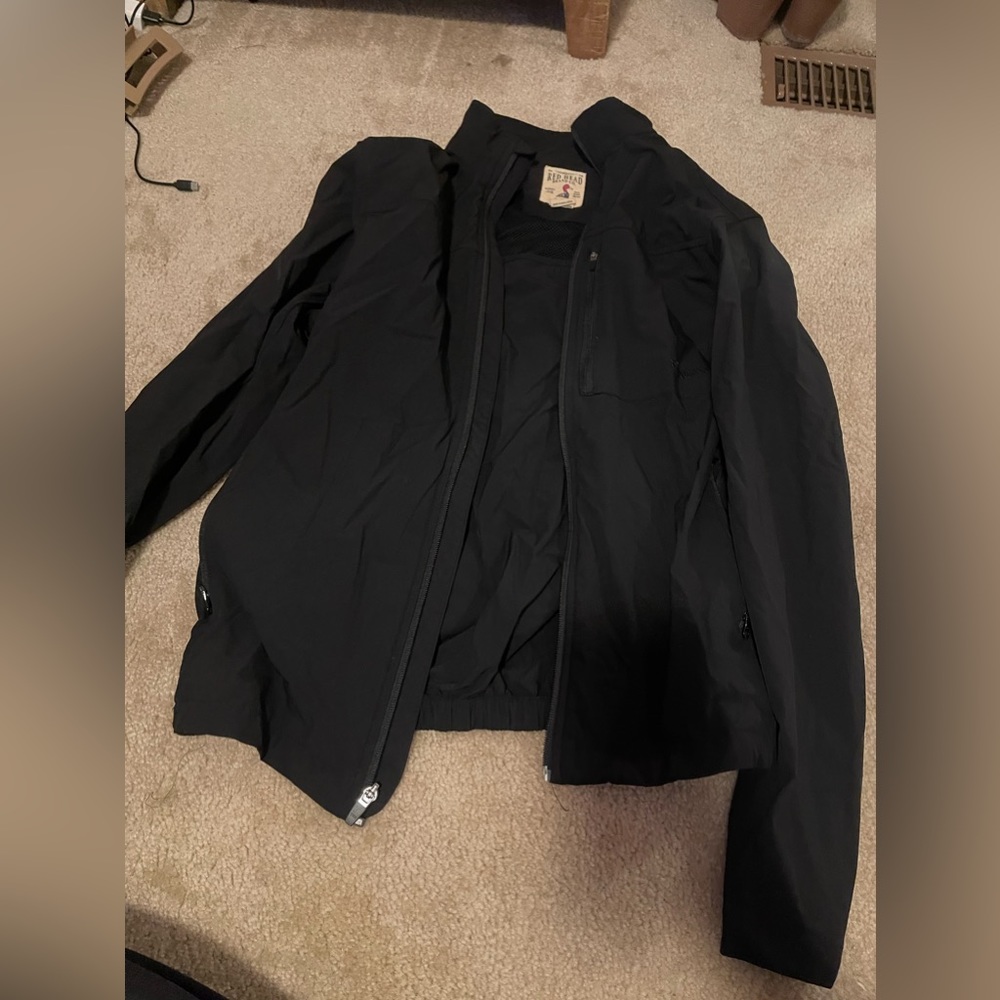 black zip up wind breaker